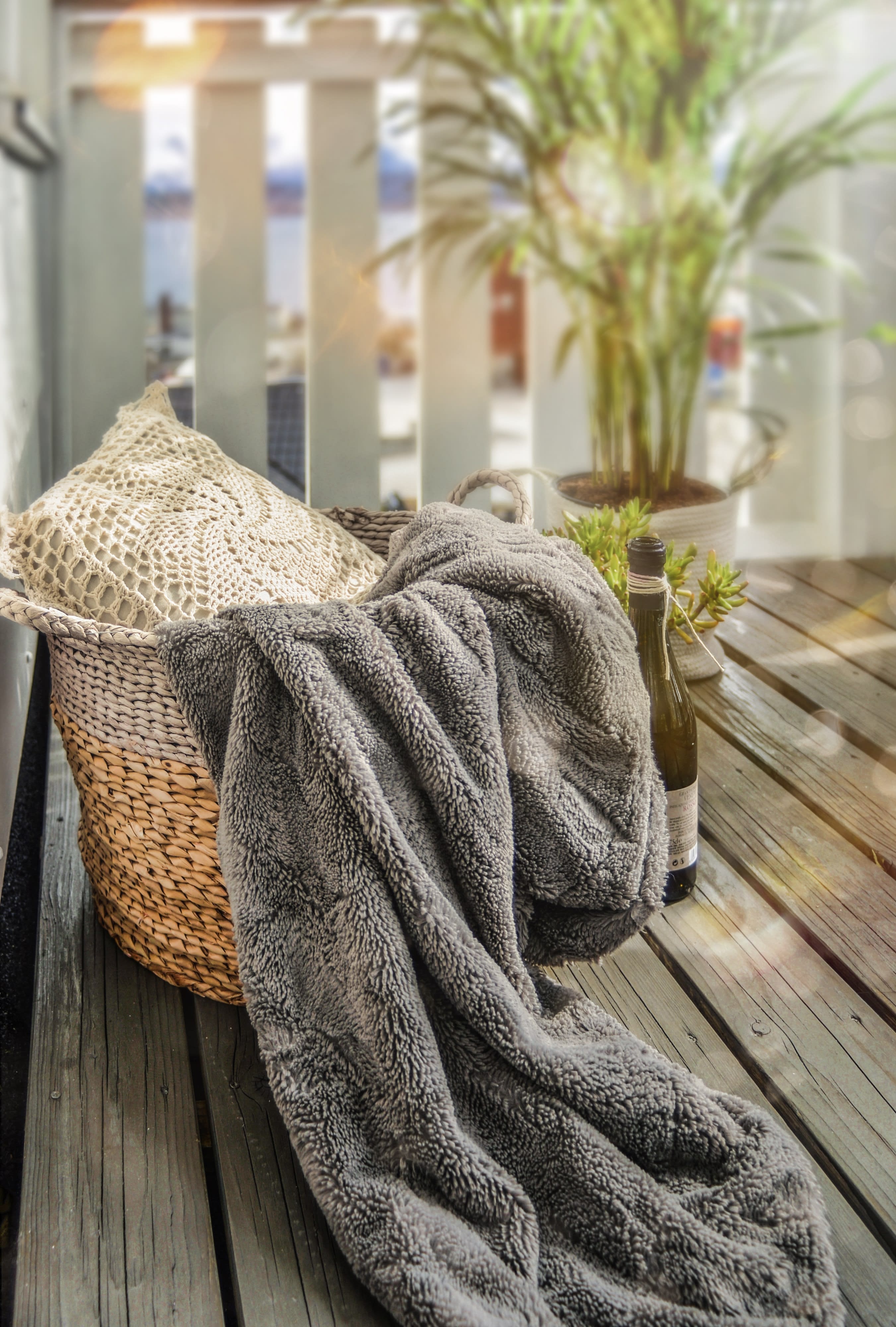 porch basket with pillow and blanket 